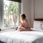 Resident relaxing in room at Together Co-Living Melbourne